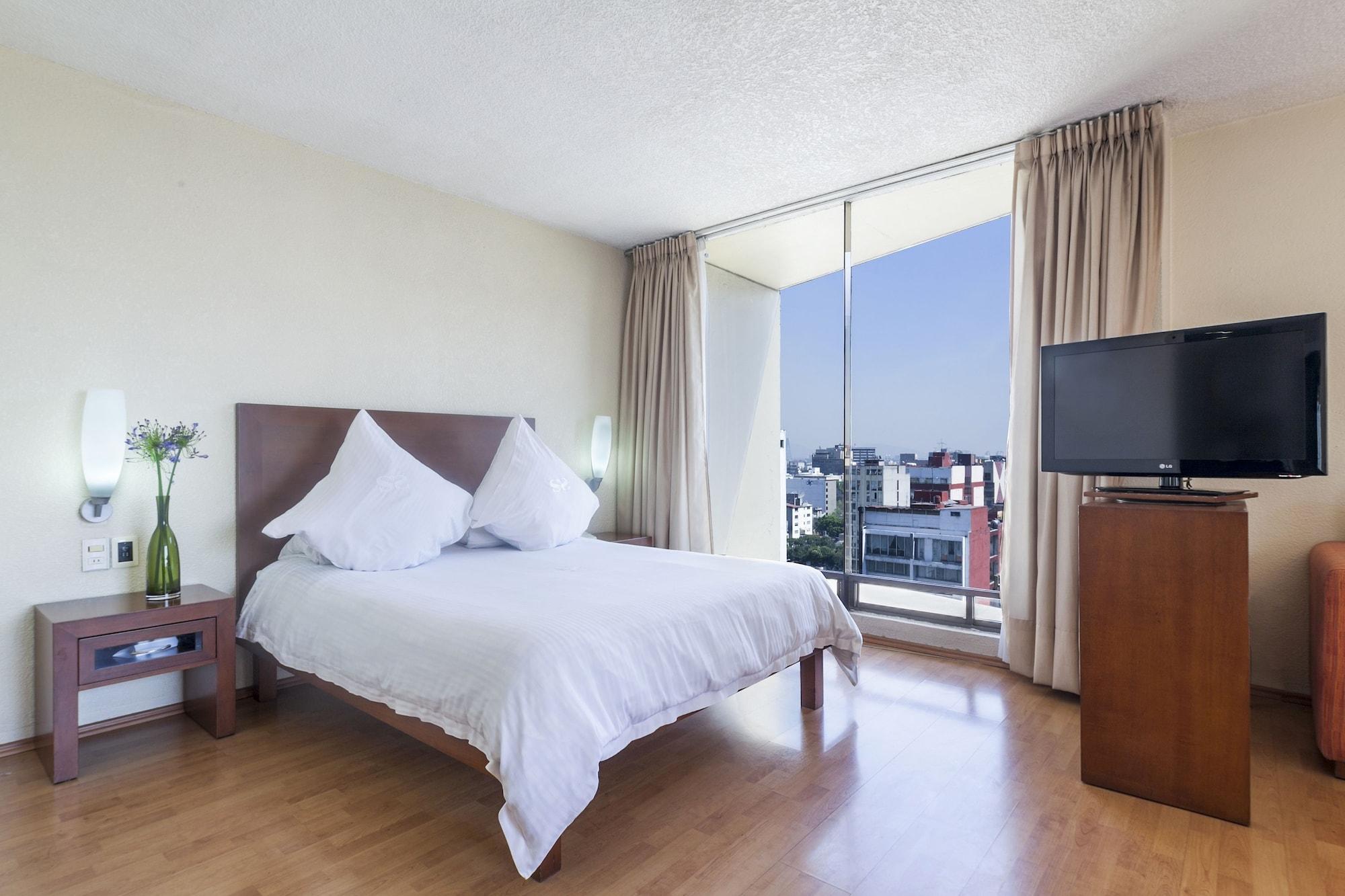Exe Suites San Marino Mexico City Exterior photo A bedroom at the hotel